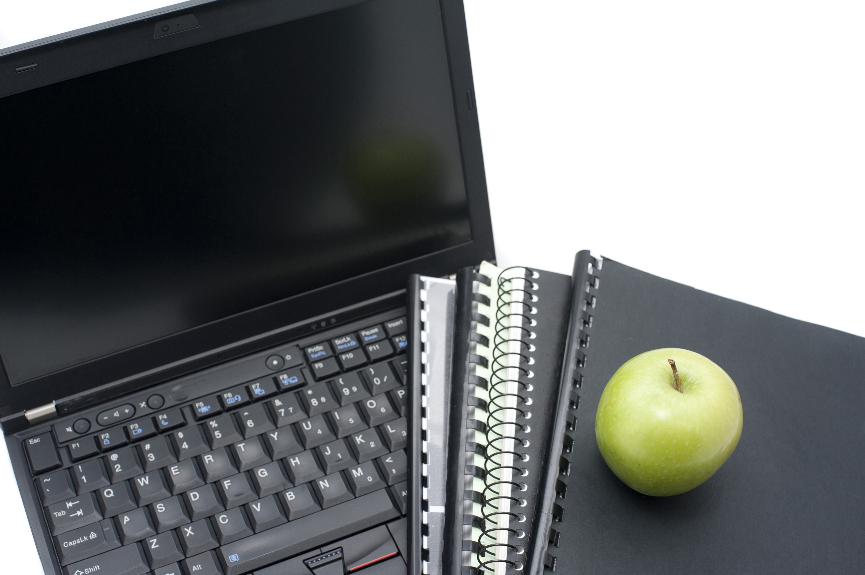Image of Laptop with school supplies